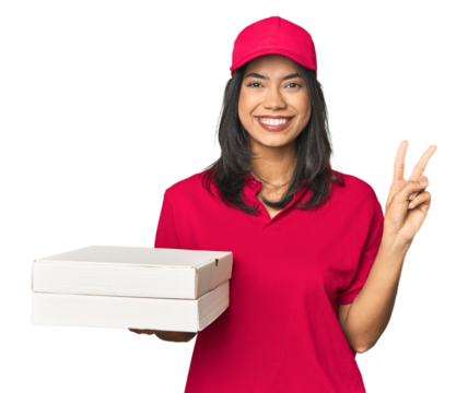 Latina delivering pizza, studio setup showing number two with fingers.