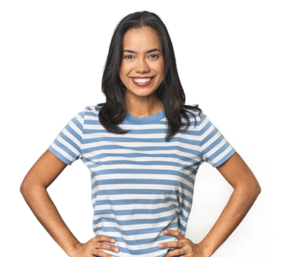 Young Latina posing in studio confident keeping hands on hips.