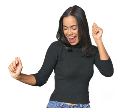 Simple portrait of a young Latina dancing and having fun.