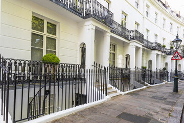 Elegant White Stucco Georgian Terraced Houses with Wrought Iron Railings, London