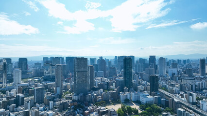 Drone aerial view of modern city and blue sky