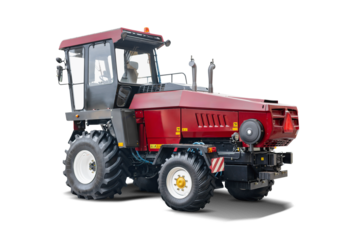 Agricultural tractor in striking red color with robust tires, designed for various farming tasks, isolated against a clean white backdrop, emphasizing its sturdy build.