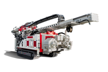 A modern drilling rig in transport position, against an isolated background, improves operational efficiency through expanded capabilities and efficiency during well drilling.