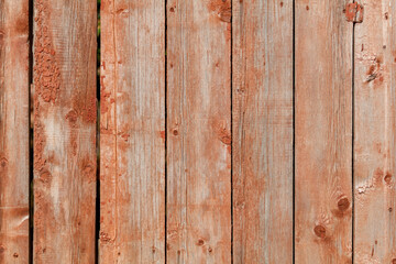 A wooden fence with a brown color