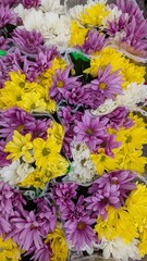 A Vibrant and Beautiful Flower Bouquet Featuring Gorgeous Purple, Yellow, and White Blooms