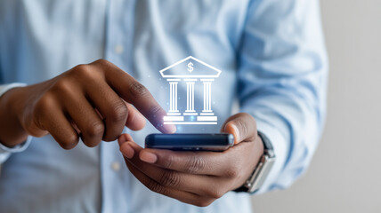 African American man using smartphone to access banking services, with digital bank icon overlay, illustrating modern financial technology and mobile banking solutions