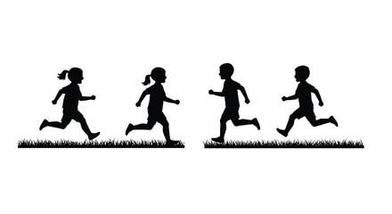 Four children silhouetted while running across a grassy field
