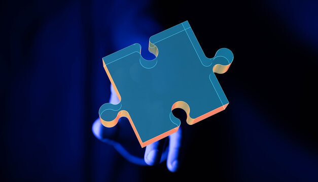 Abstract image of a hand holding a glowing puzzle piece. Represents solutions, connection, and teamwork.