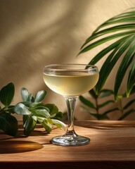 Invigorating Cocktail and Botanical: A meticulously composed still life of a refreshing cocktail elegantly presented in a crystal coupe glass, surrounded by lush greenery.