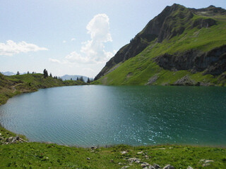 Mountain lake in the mountains. Nature backdrop. Beautiful natural flyer, card design. Nature Template for presentation or product