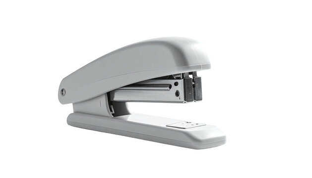 A light grey stapler, slightly angled, isolated against a black background - Powered by Adobe