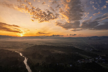 Golden sunrise aerial view in Bandar Seri Putra, Malaysia.