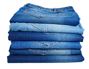 Stack of various shades of blue jeans