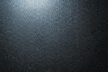Vector art of dark and textured background featuring a pattern of small, repeating hexagons, creating a visually interesting surface with a sense of depth and dimension