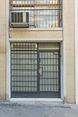 Shop with a backlit glass facade that creates a floating effect during business hours