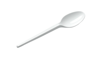 A white, plastic utensil for eating, slightly angled against a black background