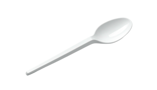 A white, plastic utensil for eating, slightly angled against a black background