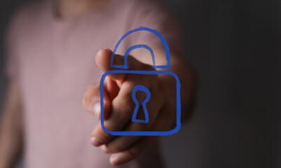 Hand interacting with a digital padlock icon, symbolizing robust data protection, online security,...