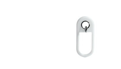 White oval loop with a small key ring on a black background