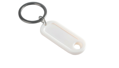 An oblong white keychain tag with a metal ring, isolated on a dark background
