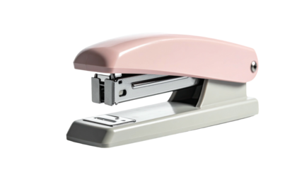 Pink and white stapler isolated on black background, ready to bind papers