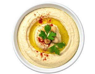 Creamy hummus in a bowl, garnished with chickpeas and parsley