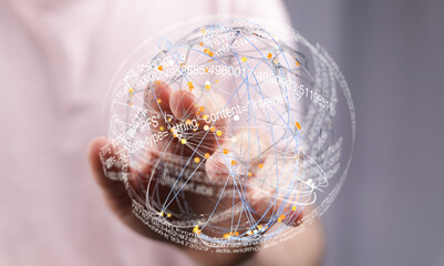 Abstract image of a hand interacting with a digital globe displaying data streams and connections.