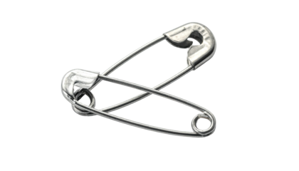 Two silver clasps crossed over each other, isolated on a black background