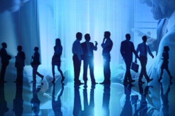 Businesspeople using their smartphones in a cafe