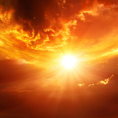 Bright sun shining through dramatic fiery orange clouds