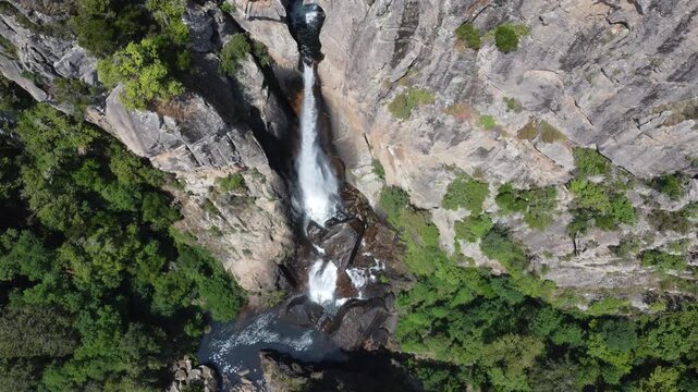 Piscia di Ghjaddu waterfall, Corsica, descending drone shot