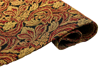 Folded luxury brocade fabric with an ornate gold and red pattern on a transparent background