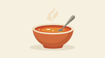 Hot soup in bowl with spoon