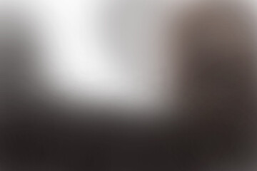 Brushed metal texture backdrop with a dramatic stage spotlight