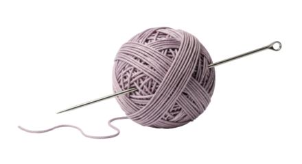 Isolated ball of dusty rose yarn with knitting needle inserted for craft projects