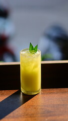 Passion fruit juice in a glass exposed to sunlight