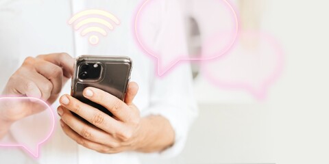 Businessman checking his social media account and messages on a phone
