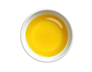 Small, round, white bowl filled with golden-yellow liquid
