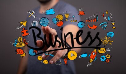 Obraz premium Dynamic image of a hand touching a digital 'Business' word surrounded by vibrant icons representing strategy, growth, global reach, and innovati
