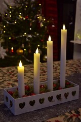 Four Advent candles are burning.  Christmas decor.Christmas in Sweden.