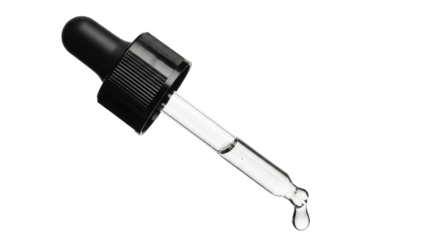Isolated eyedropper is clear with a black bulb and a drop on the tip ready for use