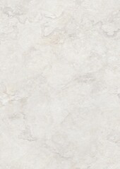 Close-up of white marble surface with subtle gray veining and natural texture