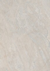 Close-up of a light-colored textured surface with subtle veining patterns