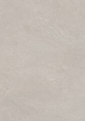 Close-up of a smooth, light gray textured surface with subtle variations in tone and faint patterns.