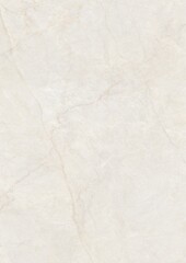 Close-up of light-colored marble surface with natural veining patterns