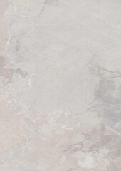 Abstract textured surface with soft gray and pink hues