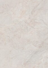 Close-up view of a light-colored marble surface with subtle veining and natural texture