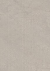 Neutral textured surface with subtle variations in tone and pattern