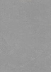 Close-up of a plain gray textured surface with subtle scratches and wear marks