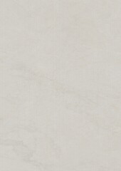 Fototapeta premium Close-up of a smooth, light gray textured surface with subtle variations in tone and fine grain patterns.